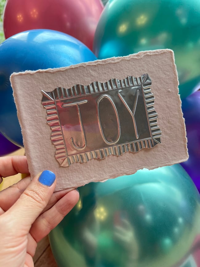 Embossed foil notecards