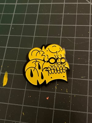 Image of Yellow Enamel skull pin 