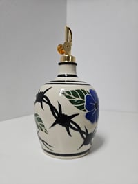 Image 2 of Oil Bottle 5 - Flowers & bared wire