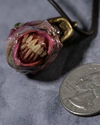 Image 2 of Egg of the King bruised pendant, leather cord, brass hardware
