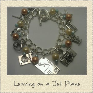 Image of 'Leaving on a Jet Plane' Holiday Themed Charm Bracelet