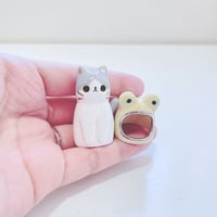 Image 4 of Gray and white cat with frog hat ceramic figurine (white gold version)