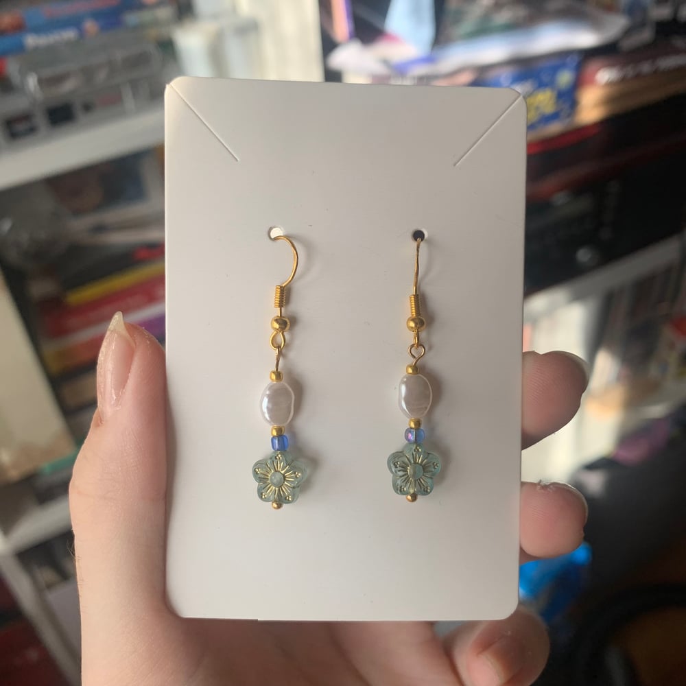 Image of blue n gold bead earrings