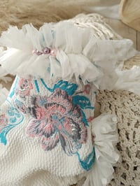 Image 2 of Photo prop | Sitter baby bodysuit | Marella | age 9-12 months | pink&turquoise flowers