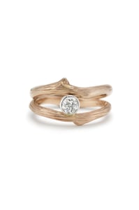 Image of custom vineyard engagement and wedding rings