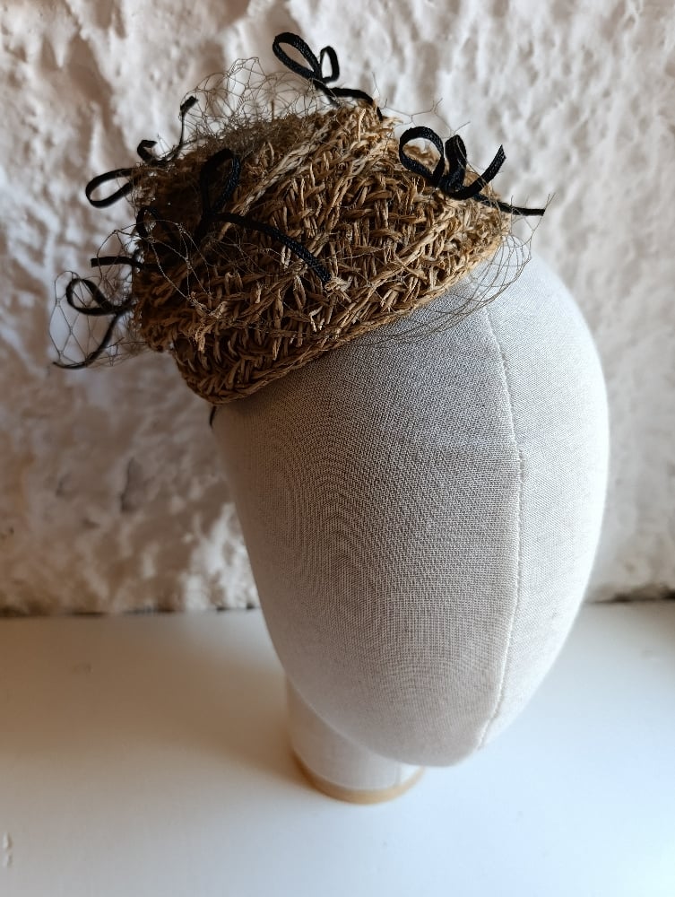 Image of Fascinator nido di fiocchi