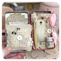 Image 5 of A Petite French tin with a needle book and tattered pin cushion