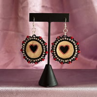 Image 1 of black heart beaded parfleche earrings