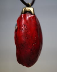 Image 7 of Berserk Egg of the King screamer pendant, leather cord, brass hardware, OOAK