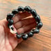 Image of Hawaiian Kupe'e shell bracelet with puka and cowrie lip clasp