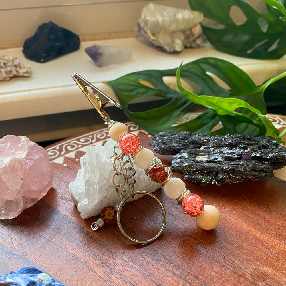 Image of red hibiscus clip keychain 