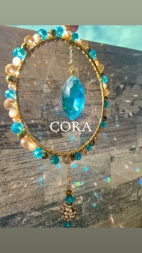 Image 1 of Cora - Orbit