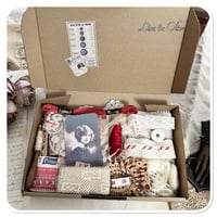 Image 2 of box of vintage french lace and other haberdashery items.
