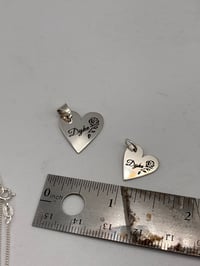 Image 2 of Cursive Dyke Charm
