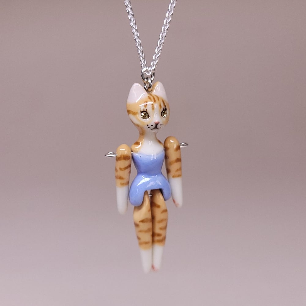 Image of Ginger Tabby Porcelain & Sterling Silver Articulated Doll Pendant