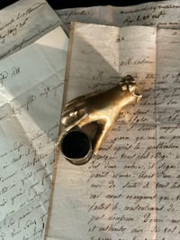 Image 1 of Bougeoir, presse papier en bronze massif, en forme de main, début 1900