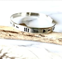 Image 4 of Luna symbol silver stamped cuff bracelet. Handmade crescent moon patterned bracelet (6mm)