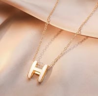 Image 1 of Gold-Tone Necklace with White Enamel 'H' Pendant