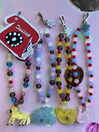 Image 2 of glass bead phone charms with trinkets 