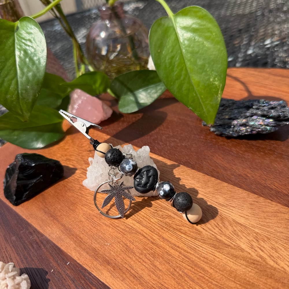Image of midnight ash clip keychain