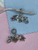 NIÑA Y NIÑO CHARM 