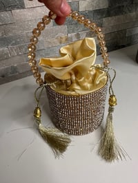 Image 1 of Small gold bucket