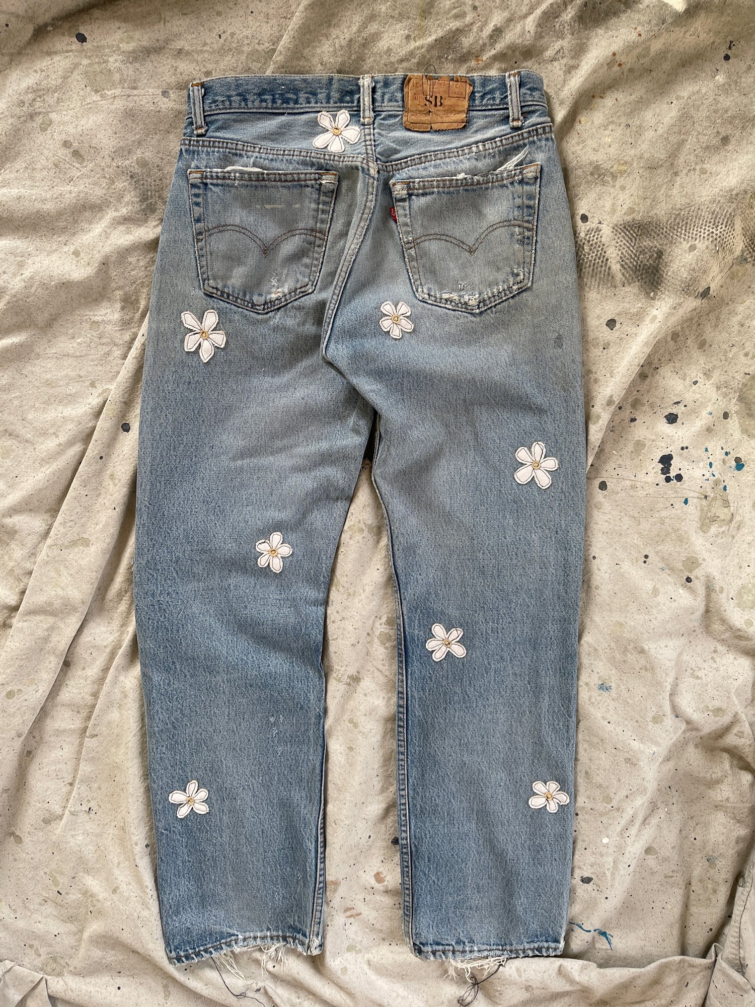 Image of Floral repaired jean 
