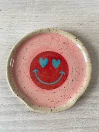 Image 1 of Pink & red Smiley spoon rest.