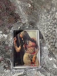Image 2 of  My goddaughter Zizi Standing on money,💵 stacks iPhone case comes with a free mini keychain