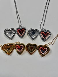 Image 2 of Worm Lockets