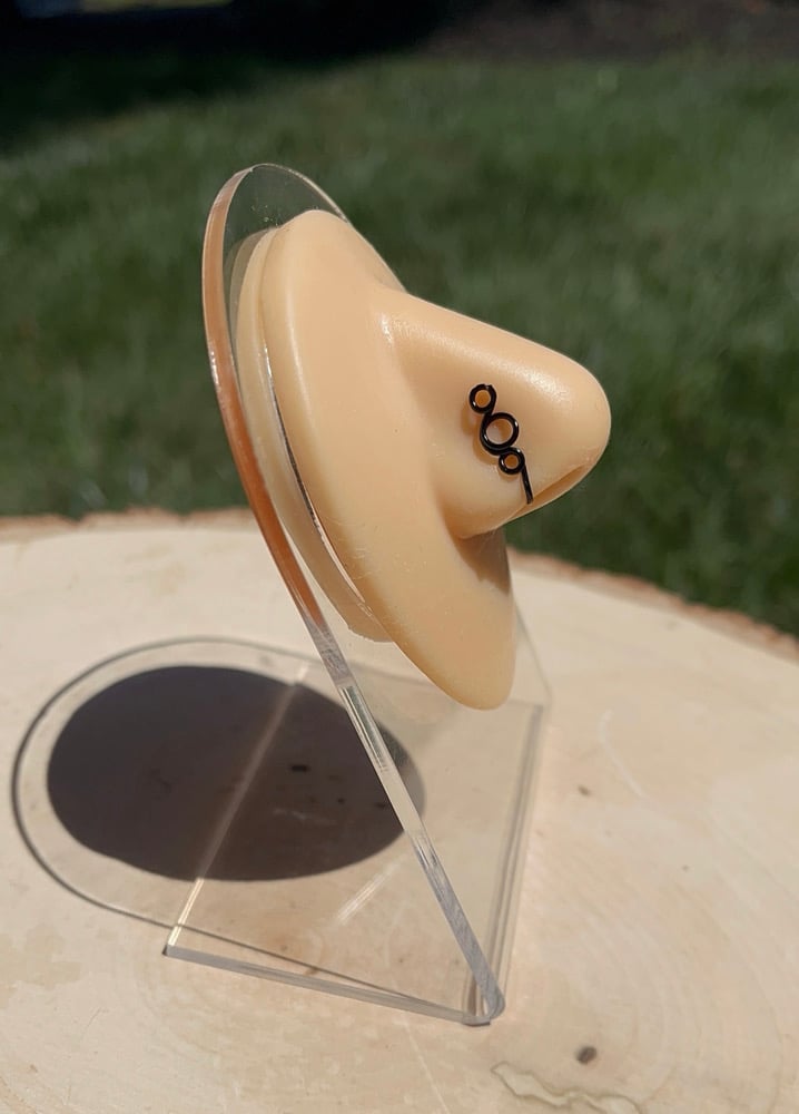 Image of Black wire nose cuffs 