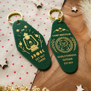 Camp Mustelid Cabin Tag Keychain