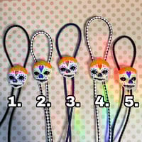 Image 2 of Bolo Marigold Catrinas