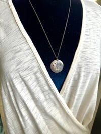 Image 17 of blue sapphire pendant with Fitzgerald quote