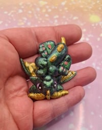 Green resin baby dragon