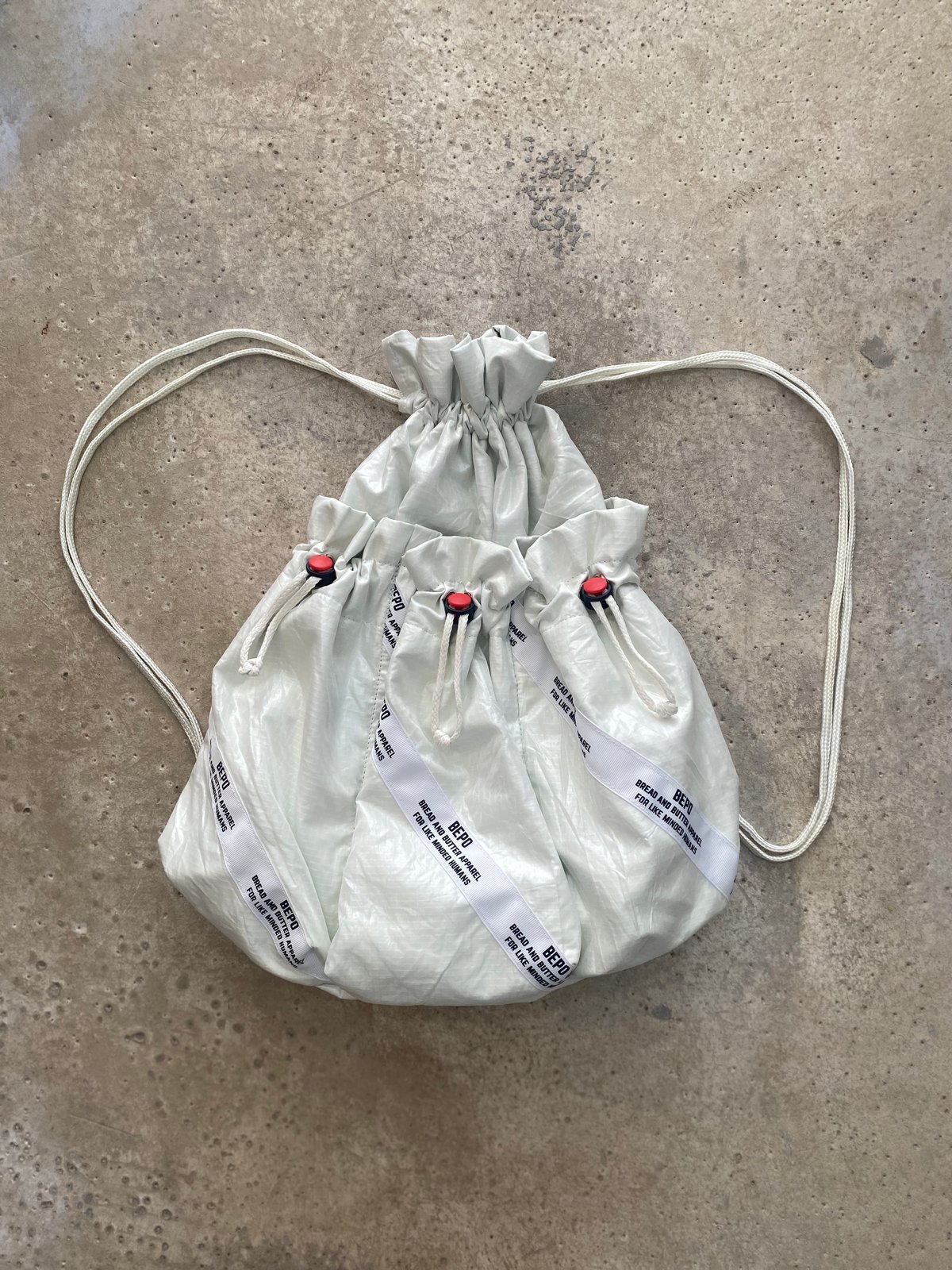 Small on sale white rucksack