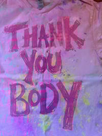 Image 1 of Light pink tie dye multi colour with light purple text tshirt (small)