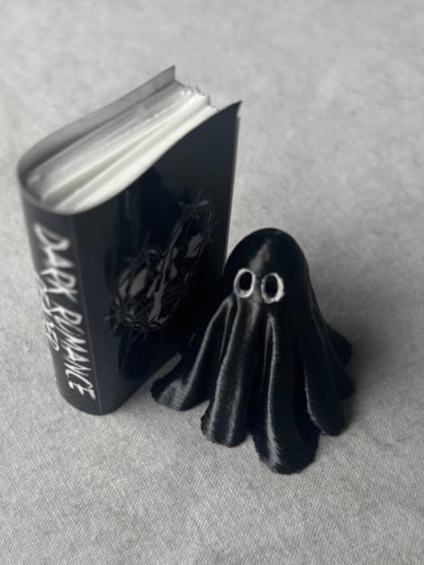Image of Ghost with trope book 