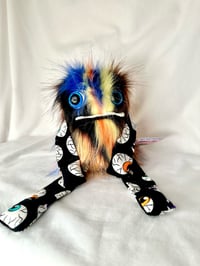 Image 4 of Glow in the dark eye ball Poof