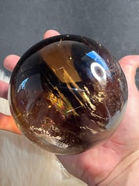 Image 19 of Golden Rutile In Smoky Quartz Sphere #1769