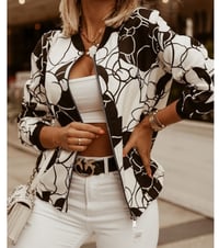 Image 5 of "Petal to the Metal"
A floral bomber that’s soft in print, fierce in style 


