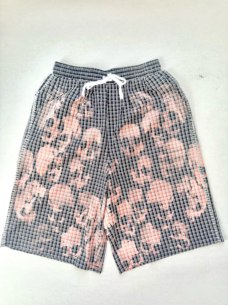 Black plaid skull shorts