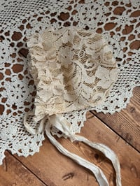 Image 7 of Antique Beige Lace Newborn Bonnet Silk Tie