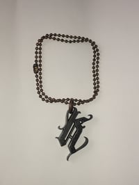 Image 1 of Baby K  rusty chain