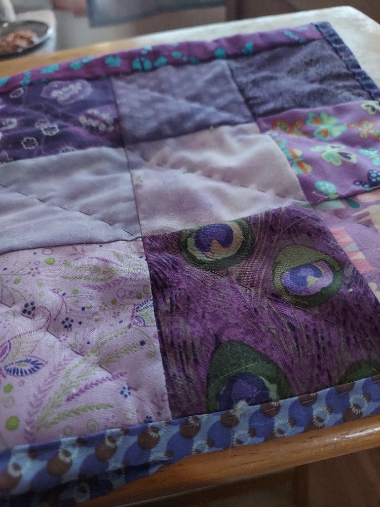 Image of custom patchwork cat quilt