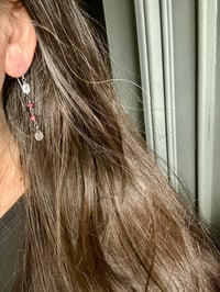 Image 4 of ruby and rainbow moonstone dangle earrings with sterling silver medallions