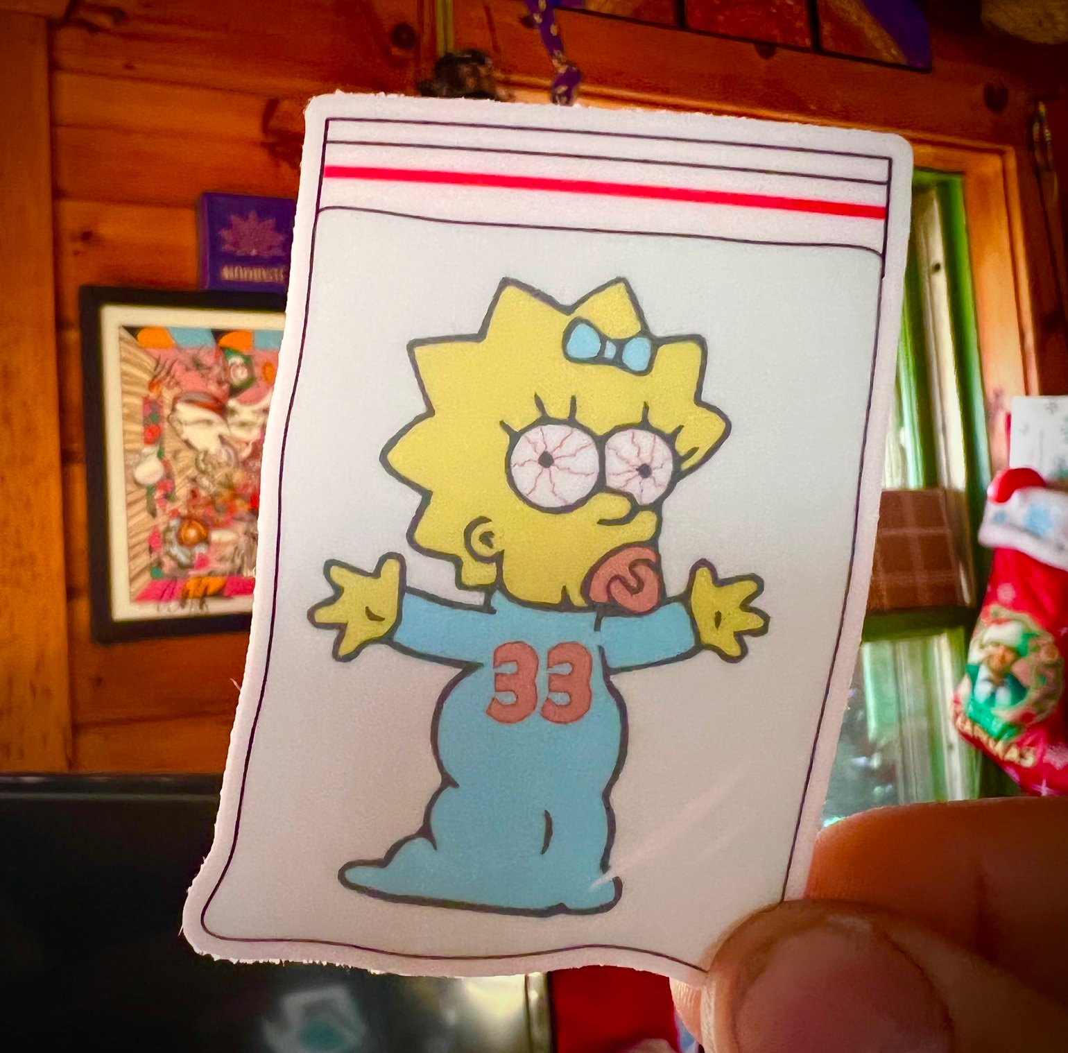 Image of Maggie in a baggie Sticker