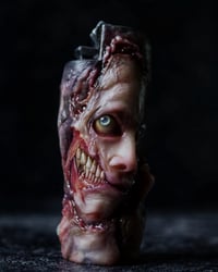 Image 12 of Face Off - collectible Clipper Lighter Sleeve