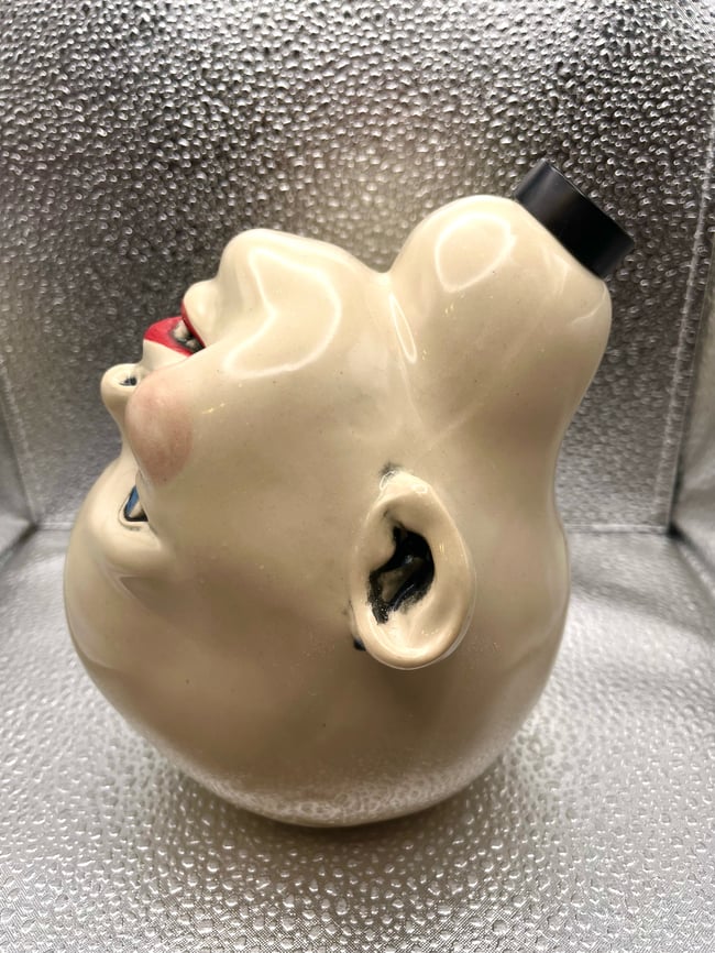 Upside Down Head Vase. 