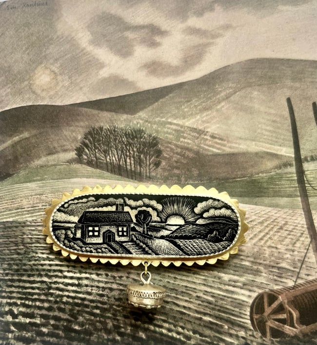 HOME AND SILVER BUTTON BROOCH